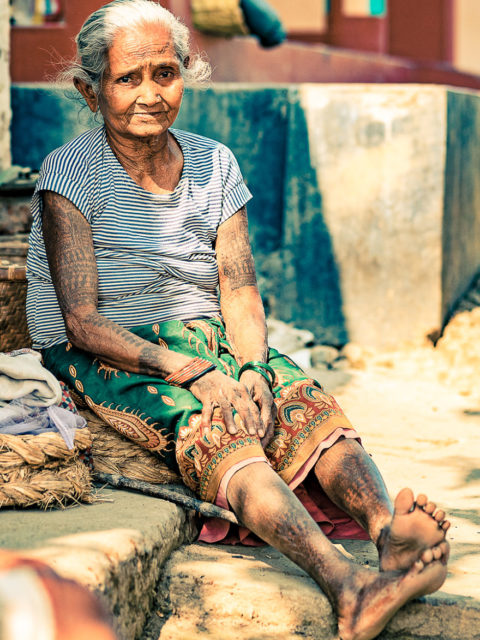 It is said that they used to do tattoos in order to avoid becoming chosen as sex slaves by the Royal Nepalese family who would spend their summers in the area. Photo Credit: Omar Reda