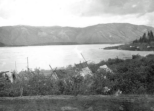 A tent-camp along the Pelly River, a Canadian tributary to the Yukon River, 1898
