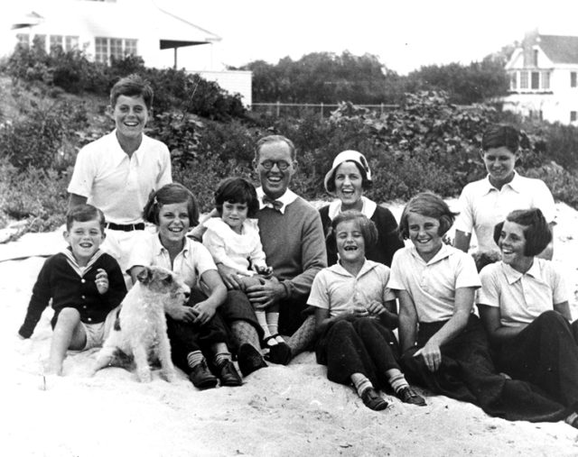 The Kennedy family at Hyannis Port Massachusetts in 1931 with Jack at top left in white shirt.