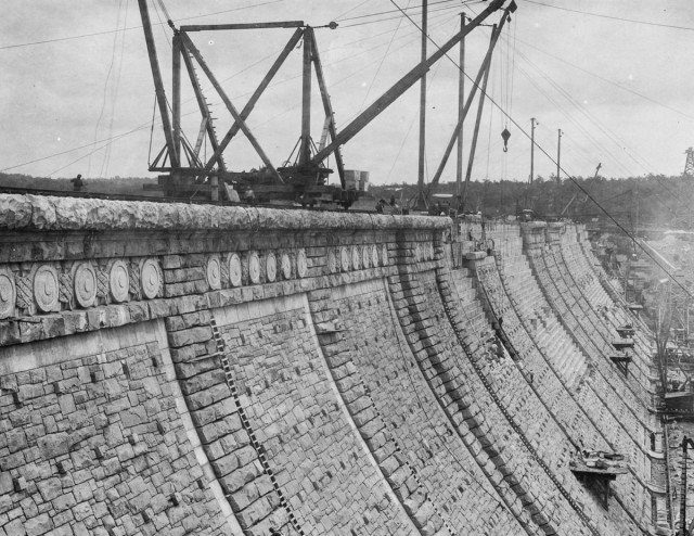 A decorative granite facade is applied to the downstream face of the Kensico Dam. Aug. 12, 1915. Author New York Public Library