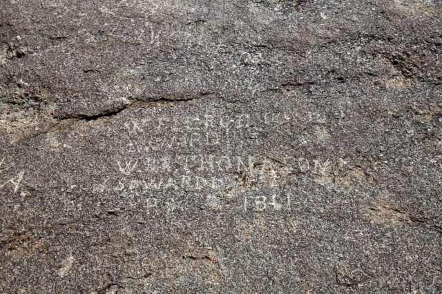 Photograph of names carved on Independence Rock, particularly of W.R.R. Thompson, W. Pierce, J. Ware and J.S.O. Ward in 1861. photo credit