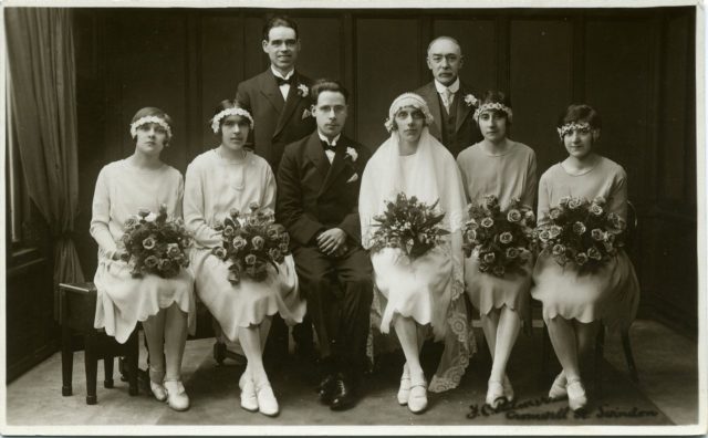 A 1920s or 1930s portrait photo of wedding group at Swindon, Wiltshire, England.