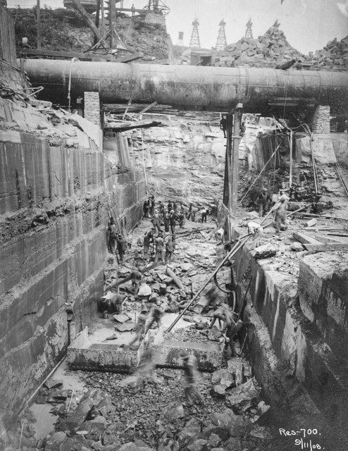 Work in progress on the cut-off trench under the masonry portion of the Olive Bridge Dam. Sept. 11, 1908 Author New York Public Library