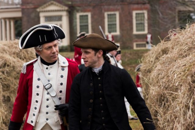 Ashley Smith as Captain Wakefield and Jamie Bell as Abe Woodhull, in 1770s  Long Island, New York. Photo Credit: Antony Platt/AMC