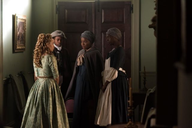 Far left, Ksenia Solo as Peggy Arnold and, second to right, Idara Victor as Abigail, in “TURN: Washington’s Spies. ” Photo Credit: Antony Platt/AMC
