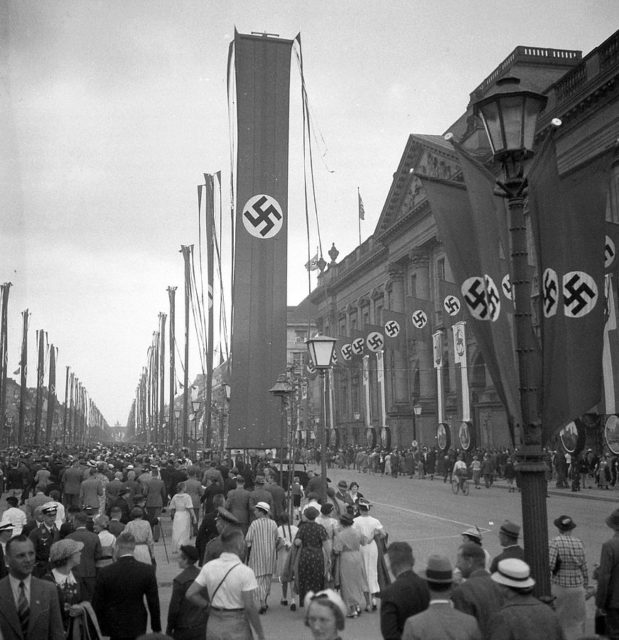 The Nazi regime organized the mass display of Nazi propaganda and symbols across Germany during the events. Photo by FORTEPAN / Lőrincze Judit, CC BY-SA 3.0