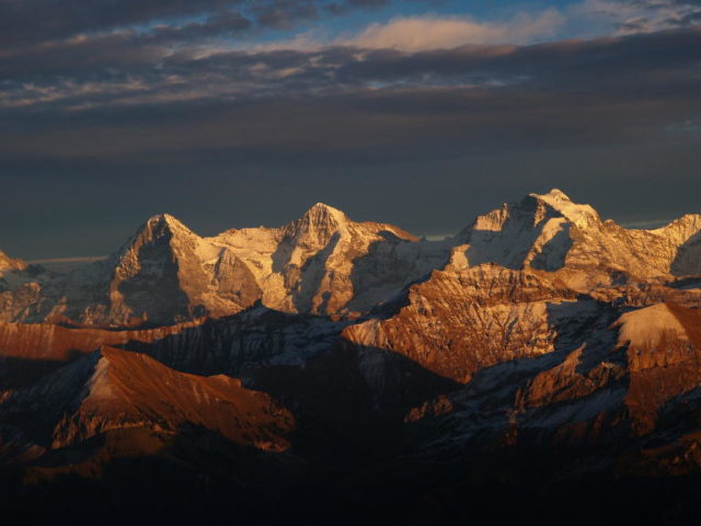 Photo showing the Bernese Alps in Switzerland: Eiger, Mönch, and Jungfrau