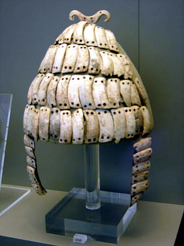 Helmets using ivory from boar tusks date from the Shaft-Grave Period (Mycenae) to the 10th century BC (Elateia, Central Greece). Author: frankfl – CC BY 2.0.