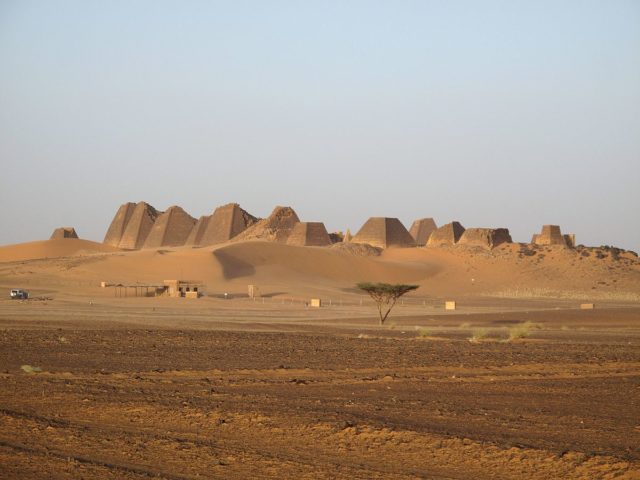 The Pyramids of Meroë in Sudan, seen from the distance, Photo by Ron Van Oers, CC BY-SA 3.0-igo