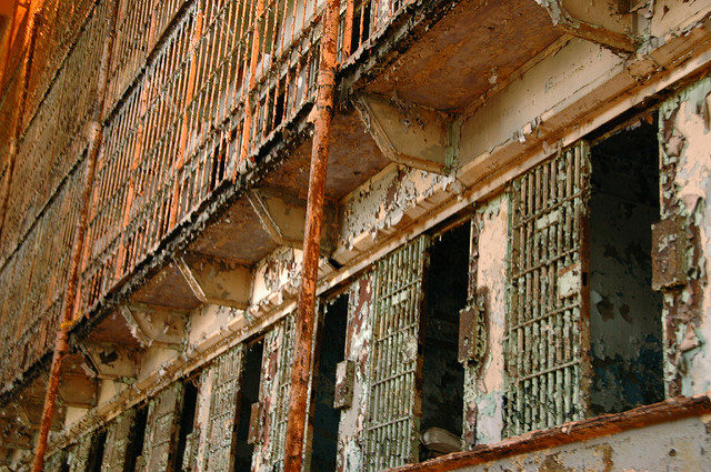 The state of the reformatory. Some of the bars were taken down before they decided not to dismantle the facility after it closed. Author quiddle. CC BY-SA 2.0