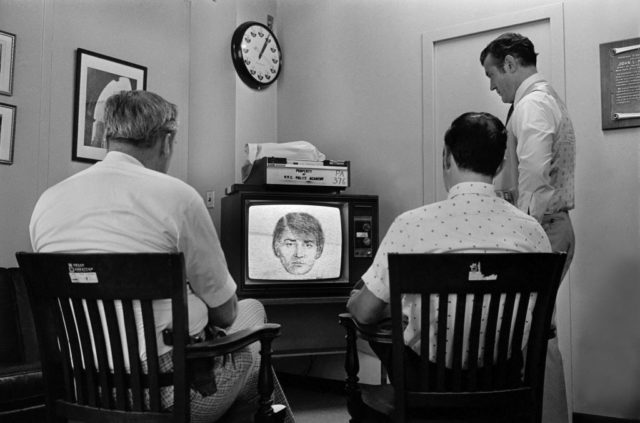 New York City police detectives observe a composite sketch of “Son of Sam” shared with 73 precinct houses. Photograph by Fred R. Conrad of The New York Times, courtesy of Sterling Publishing Co.