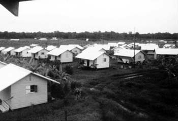 Houses in Jonestown, Guyana, 1979. Author: Fielding McGehee and Rebecca Moore CC BY-SA 3.0