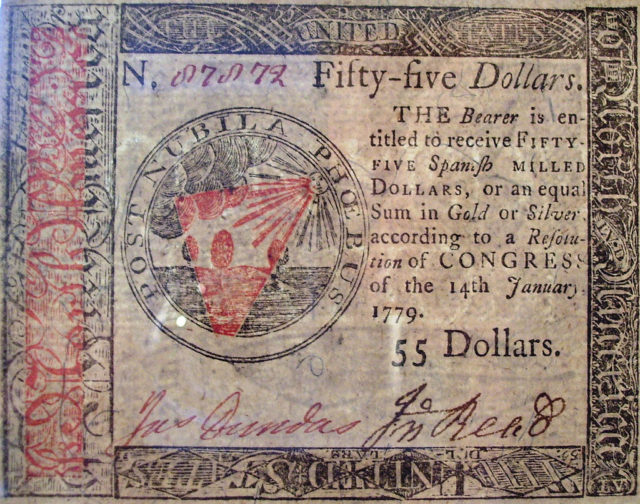 The front (or obverse or face) of a 1779 fifty-five dollar bill of Continental currency. Author Beyond My Ken, CC BY-SA 3.0