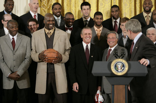 O’Neal holding the championship ball when the NBA Champion Heat visited the White House