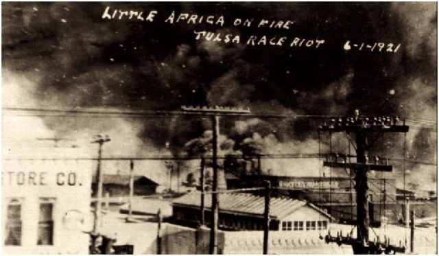Fires burning along Archer and Greenwood during the Tulsa race riot of 1921