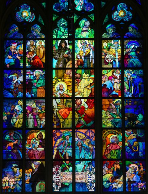 Stained glass window of the Czech Patron Saint St. Wenceslas with his grandmother St. Ludmila, surrounded by episodes from the lives of Saints Cyril and Methodius in St. Vitus Cathedral, Prague, designed by Alphonse Mucha.