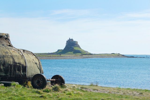 Lindisfarne castle and bay from ship hut on the island shore
