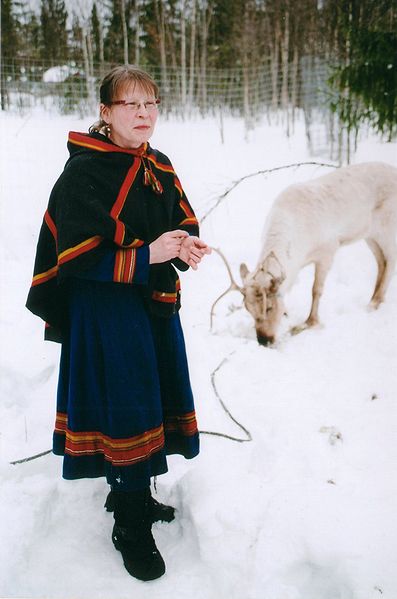 Sami woman with white reindeer. Author: Anthony Randell CC BY2.0