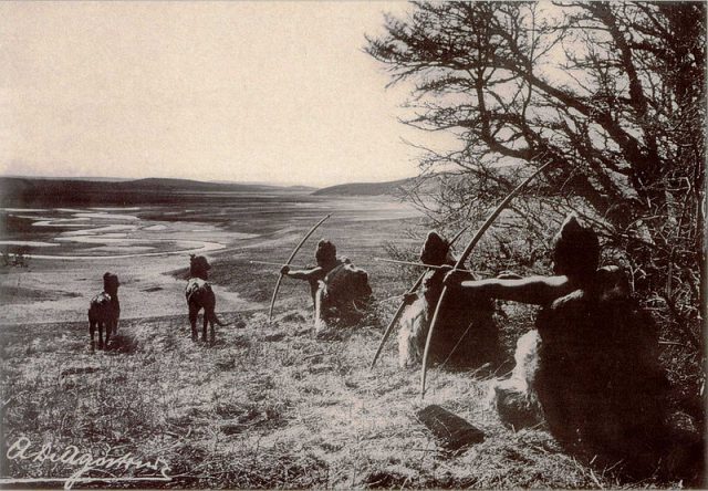 Selknam men hunting