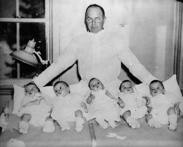 Ontario Premier Mitchell Hepburn with the Dionne babies in 1934