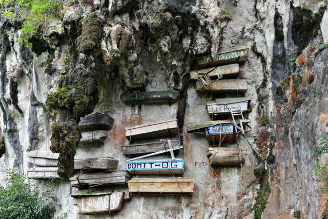 Sagada, Philippines-October 9, 2016: The Igorots practice unique funerary customs-the dead are buried in coffins tied or nailed to cliffs. Sagada-Mountain province-Cordillera region-Luzon-Philippines.