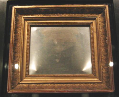 The original plate on display at the Ransom Center in 2004.