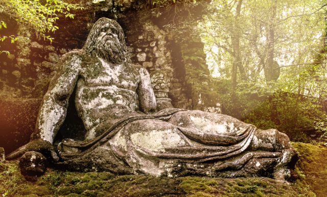 Bomarzo, Italy – April 20, 2013: The Neptune statue in Bomarzo gardens, Viterbo province in Lazio