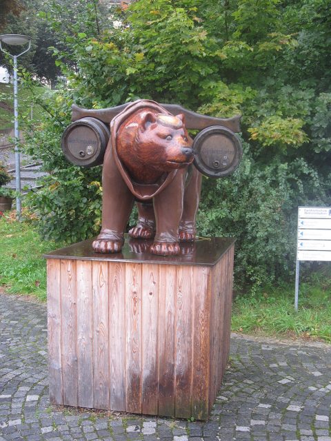 The Weihenstephaner beer bear, dressed like a Benedictine monk in a brown habit and shaved like one too, stands near the car parking at Weihenstephan. Photo Bernt Rostad CC By 2.0