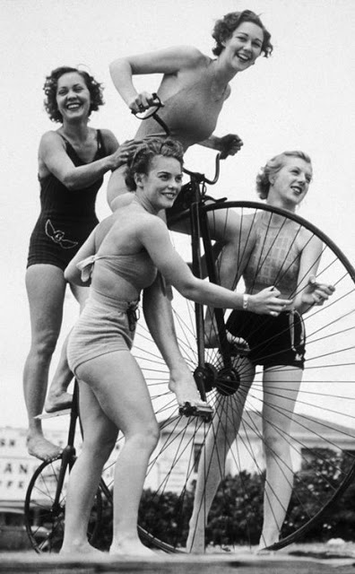 Bathing ladies on a penny farthing, ca. 1930s