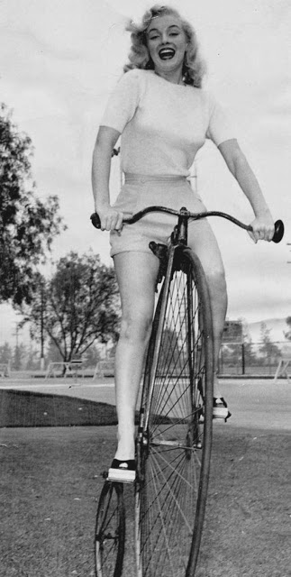 Marilyn Monroe on a penny farthing bike, 1949