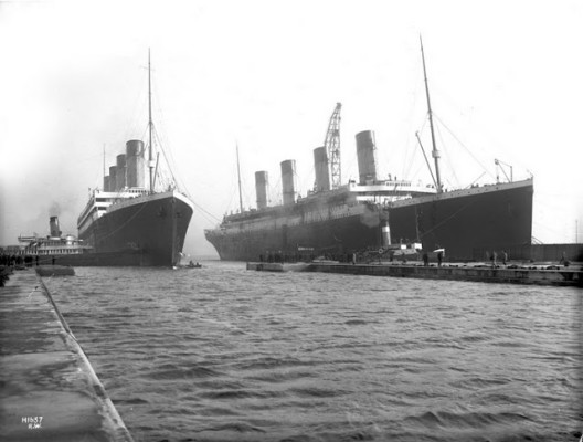 Olympic (left) being maneuvered into drydock in Belfast for repairs on the morning of March 2, 1912 after throwing a propeller blade. Titanic (right) is moored at the fitting-out wharf. Olympic would sail for Southampton on the 7th, concluding the last time the two ships would be photographed together. source