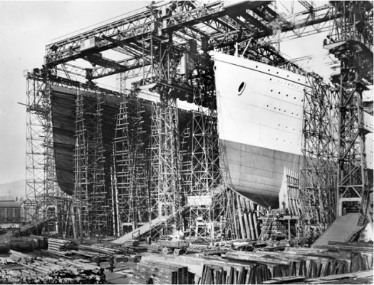 Olympic and Titanic's empty hulls have been under construction beneath the gantry for 2 years. source