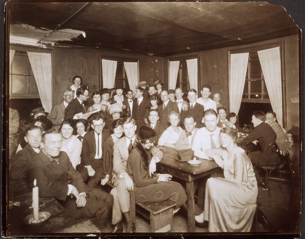 Group portrait, indoors, of people gathered at the Garrett Coffee House, ca. 1912-1917. Photo credit: Schlesinger Library on the History of Women in America