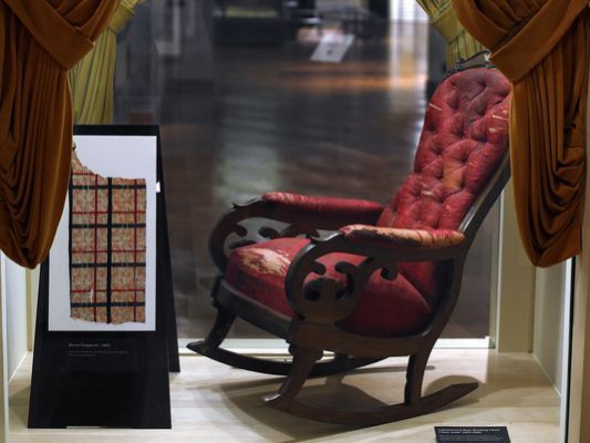 The upholstered seat rocking chair in which President Abraham Lincoln was assassinated on April 14, 1865. source