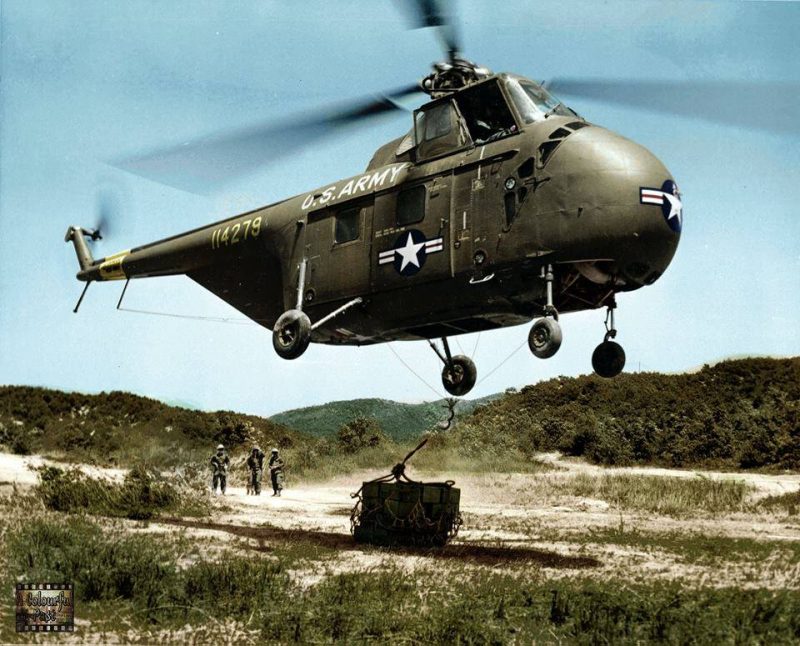 A U.S. Army H-19 'Chickasaw' helicopter crew, assigned to the 6th Transportation Helicopter Company, Eighth Army-Korea, delivers C-rations to the 35th Infantry Regiment, 25th Infantry Division, near Panmunjom, May 23, 1953. (Colourised by Allan White from Australia) https://www.facebook.com/AColourfulPastRevisited/