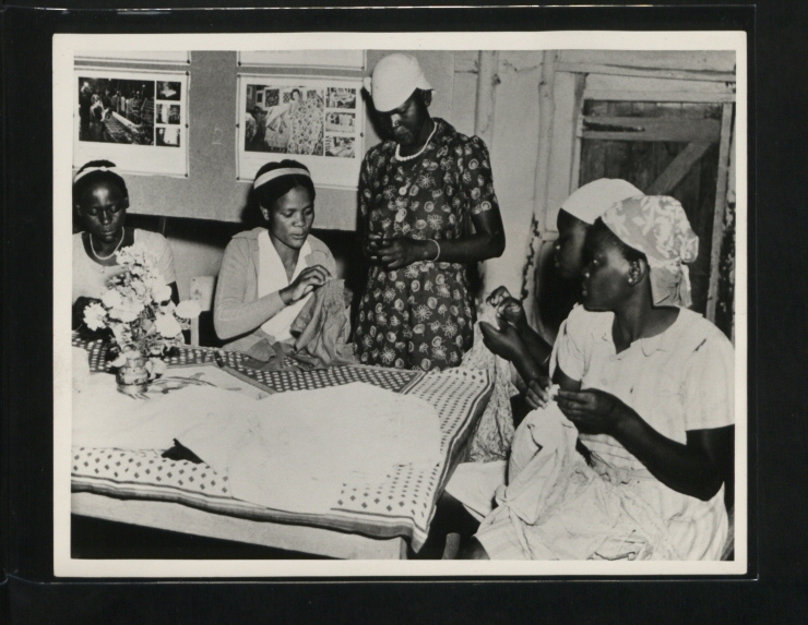  British Official Photograph (Kenya). Classes in needlework and knitting are held for women attending the Maseno Social Centre, one of a number of such centres in Kenya