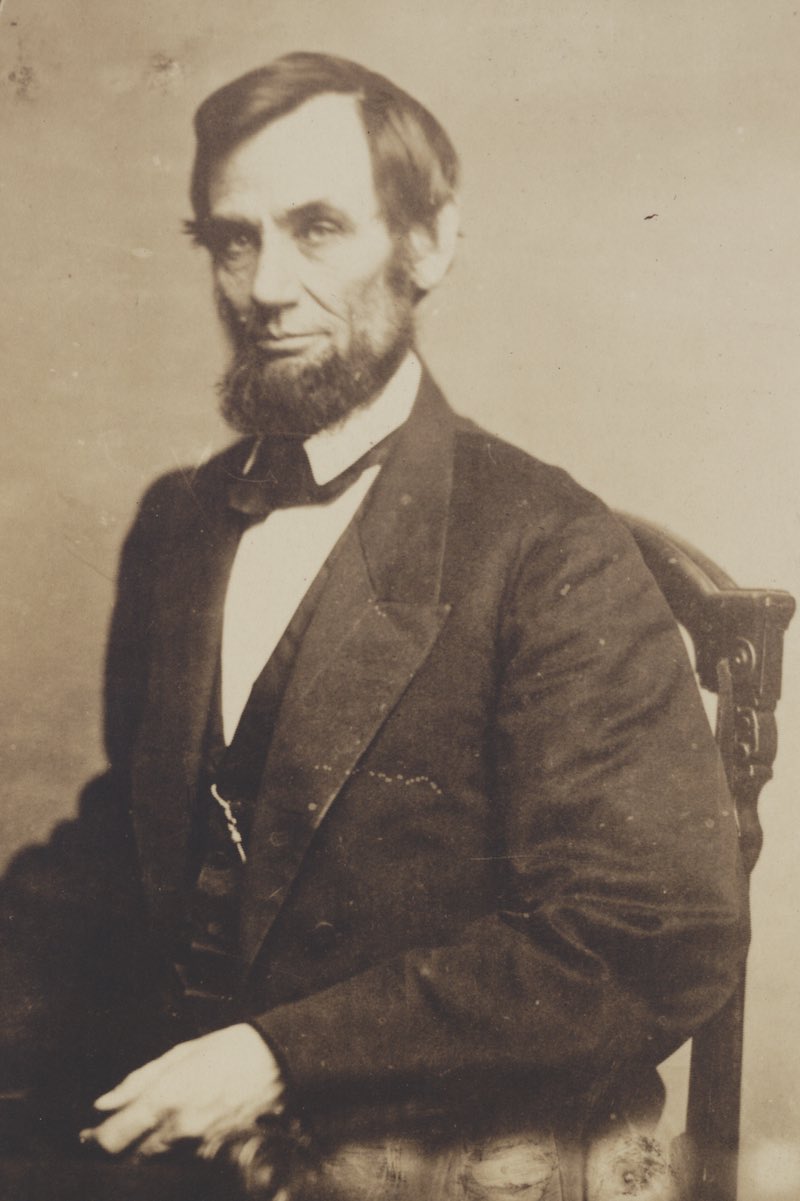  May 16, 1861-President Abraham Lincoln, three-quarter length portrait, seated, wearing his pocket watch