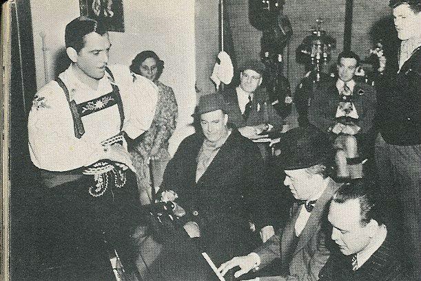 Stan and Marvin Hatley at piano; Walter Woolf King at left; Hal Roach, Jr., at far right