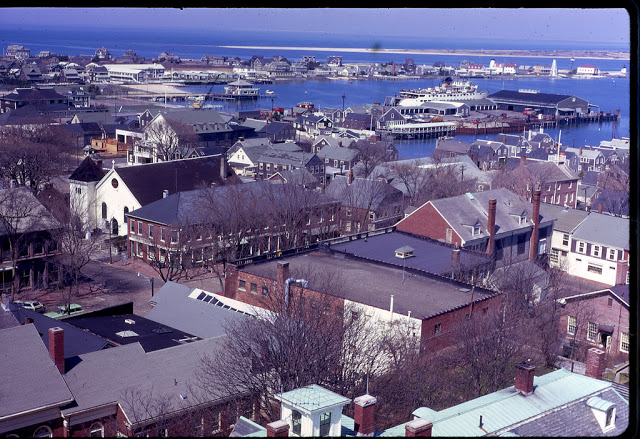 View from the tower of the Unitarian Church town clock, showing the downtown Main Street square and Brant Point)