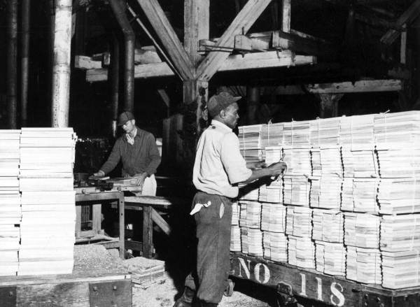 Workers working at Lee Tidewater Cypress Company's molding factory - Perry, Florida
