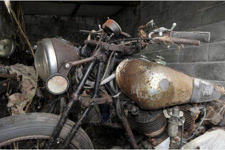 One of the highly sought after Brough bikes as it was found in a barn in Bodmin, Devon. See SWNS story SWBROUGH; A treasure trove of motorcycles regarded as the Rolls-Royces of the bike world have been discovered after being left to rot in a barn for 50 YEARS. The eight Brough Superiors have gathered dust and rust for decades until what is being described as one of the greatest motorcycle discoveries of recent times. Brough Superior bikes, built from 1924 until 1940, are the most sought-after two-wheel transport in the world. Just 380 Brough Superiors were built  with TE Lawrence, better known as Lawrence of Arabia, a famous owner. Lawrence died when he crashed his SS in 1935.
