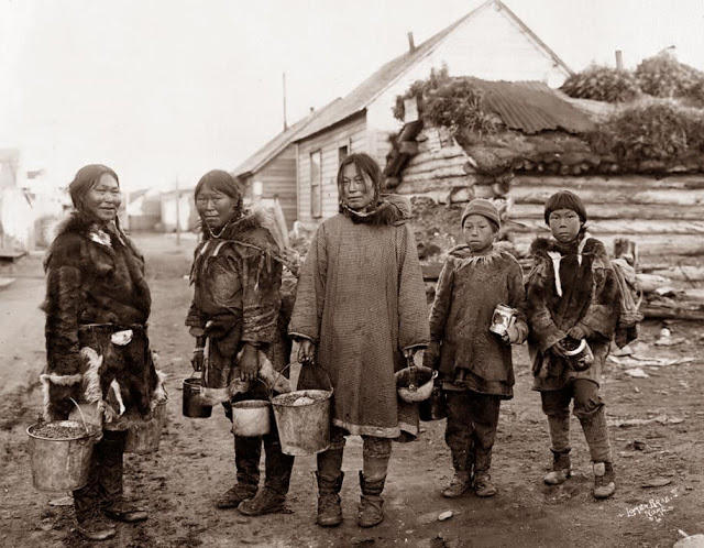 Eskimo Berry Pickers. The picture was taken near Nome, Alaska in the early 1900's.