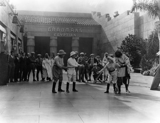 a comedy being filmed on location outside the Egyptian Theatre in 1926