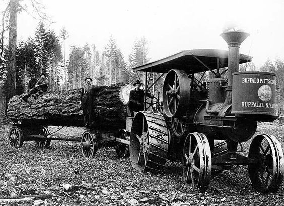 A steam tractor hauling a log back in the day in Raymond Washington. source
