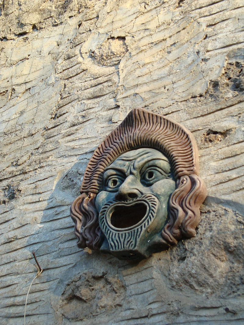 Greek mask at Kayakoy. Author: Astolath CC BY 2.0