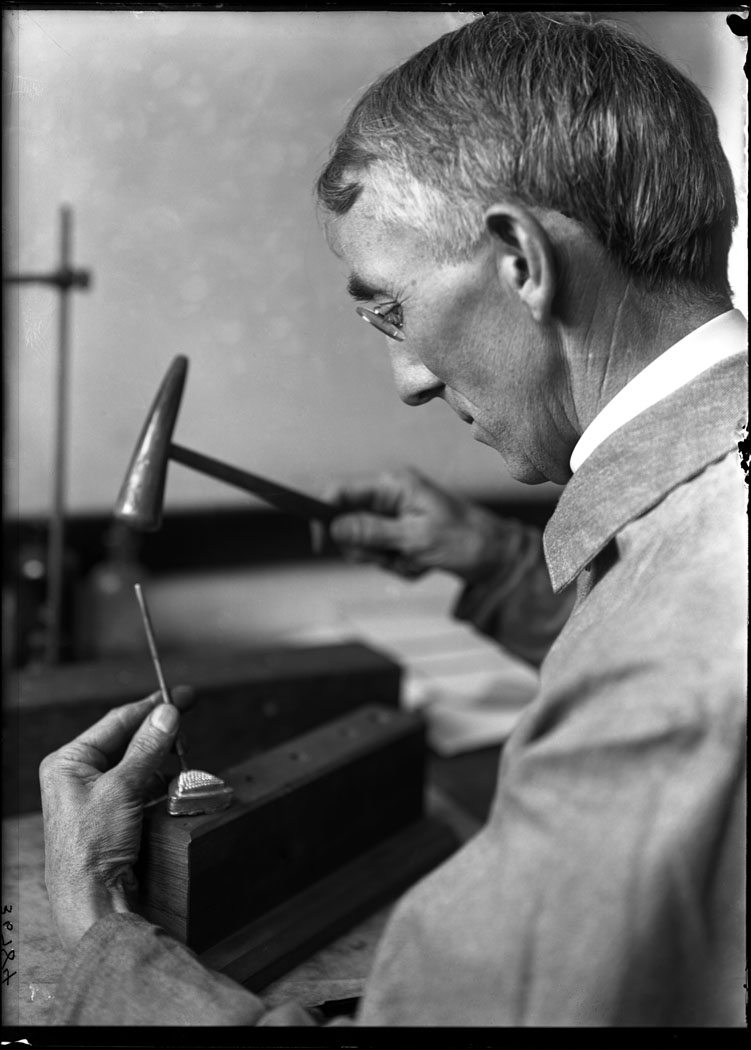 Stamping out a metal die for Diatoms celluloid pattern (Plant Reproduction laboratory), 1913