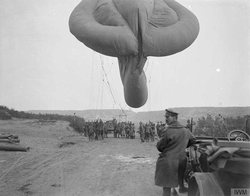 The Royal Flying Corps on the Western Front, 1914-1918 Two artillery officers about to enter the basket of an RAF Caquot kite balloon to act as observers. source