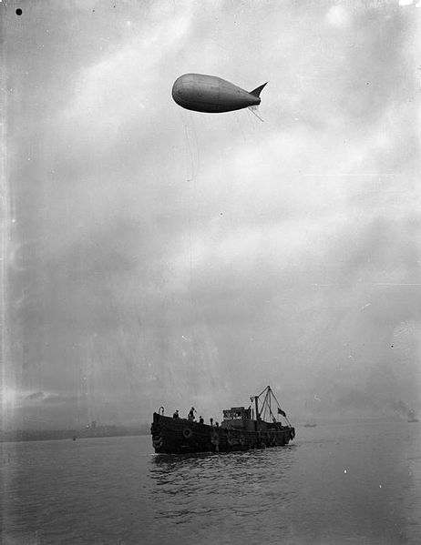 The Royal Navy during the Second World War The kite balloon drifter ROGER BLONDE delivering a balloon to a merchant ship in the River Mersey, WW2. source