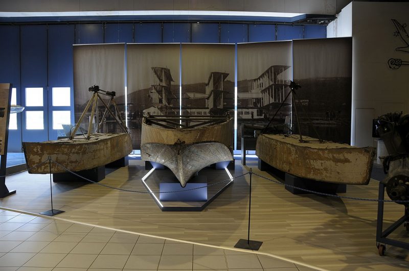 The surviving fragments of the outriggers and of the lower front section of the main hull, on display at the Gianni Caproni Museum of Aeronautics. source