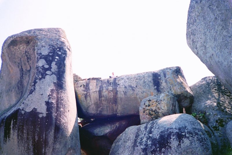 View west from the Eastern Enclosure, Great Zimbabwe, showing the granite boulder that resembles the Zimbabwe Bird. source